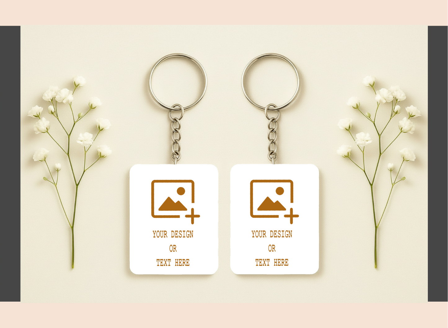 Two keychains with customizable designs on a light background with flowers.