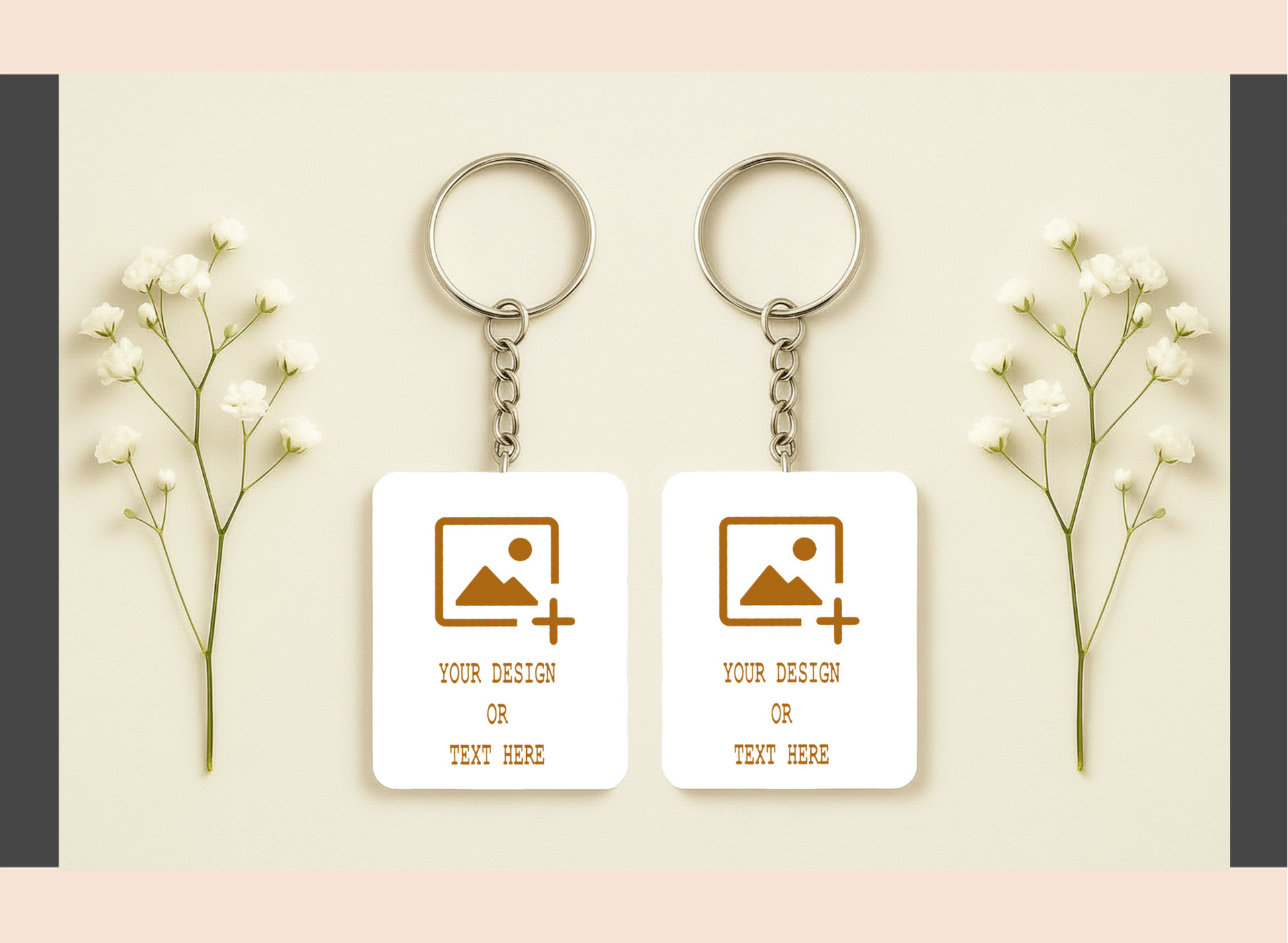 Two keychains with customizable designs on a light background with flowers.
