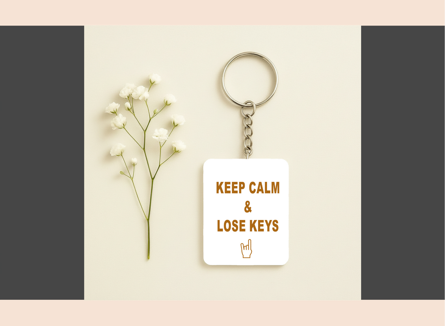 Keychain with 'Keep Calm & Lose Keys' text on a light background